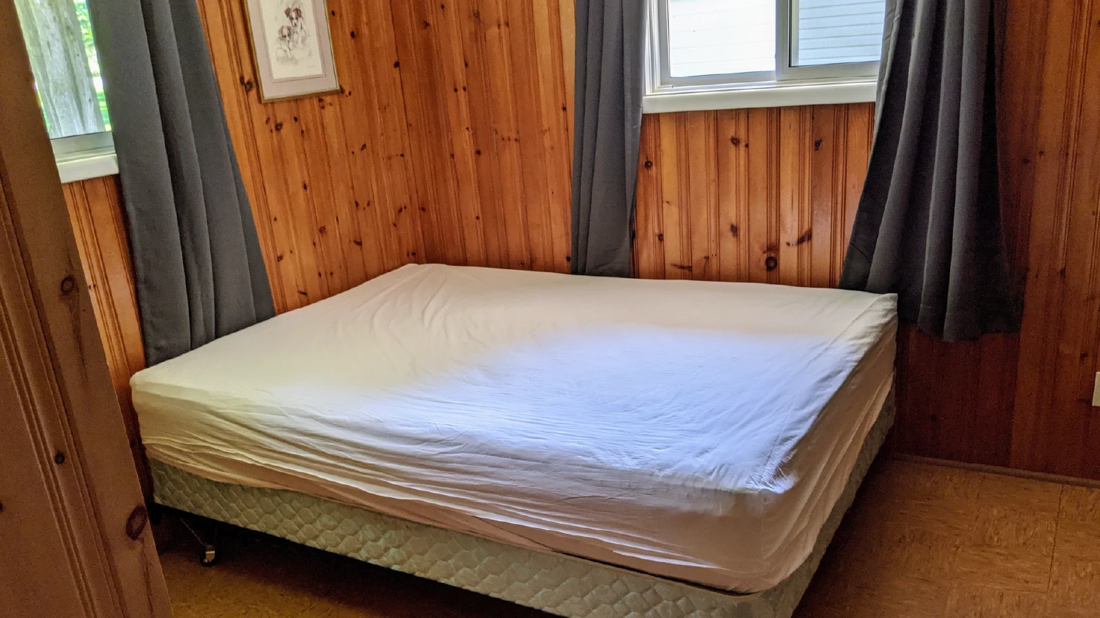 Pigeon-Lake-Resort-Cottage-eleven-main-bedroom-king-sized-bed